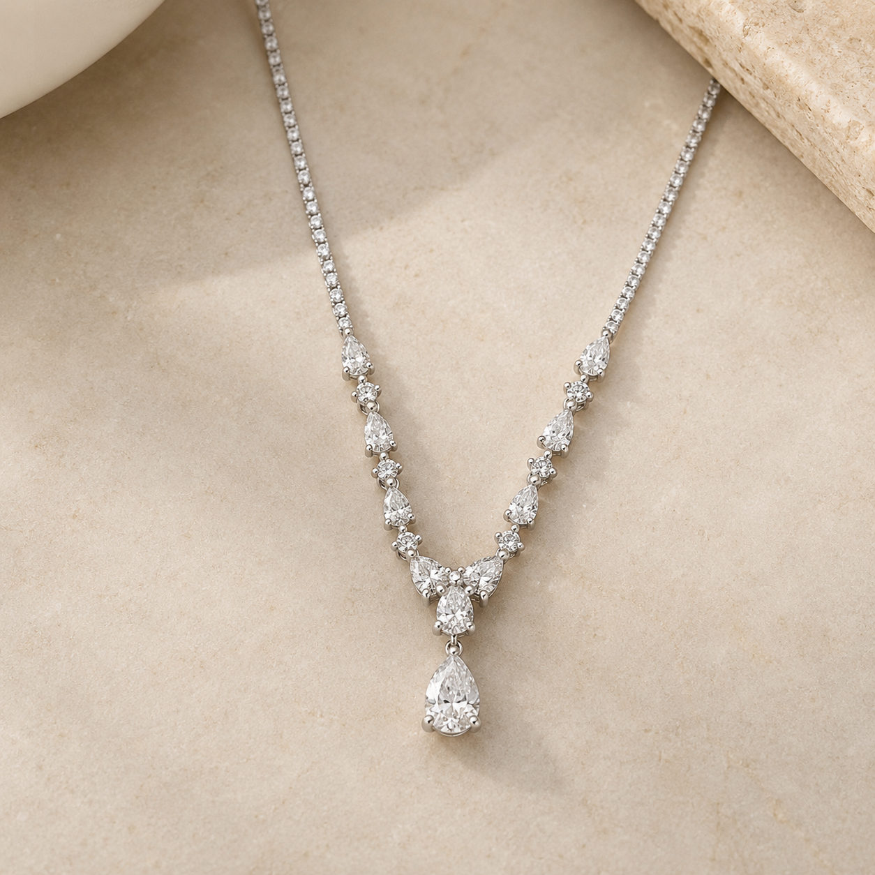 Graduated Pear-Cut Cubic Zirconia Rhodium Plated Silver Tennis Necklace