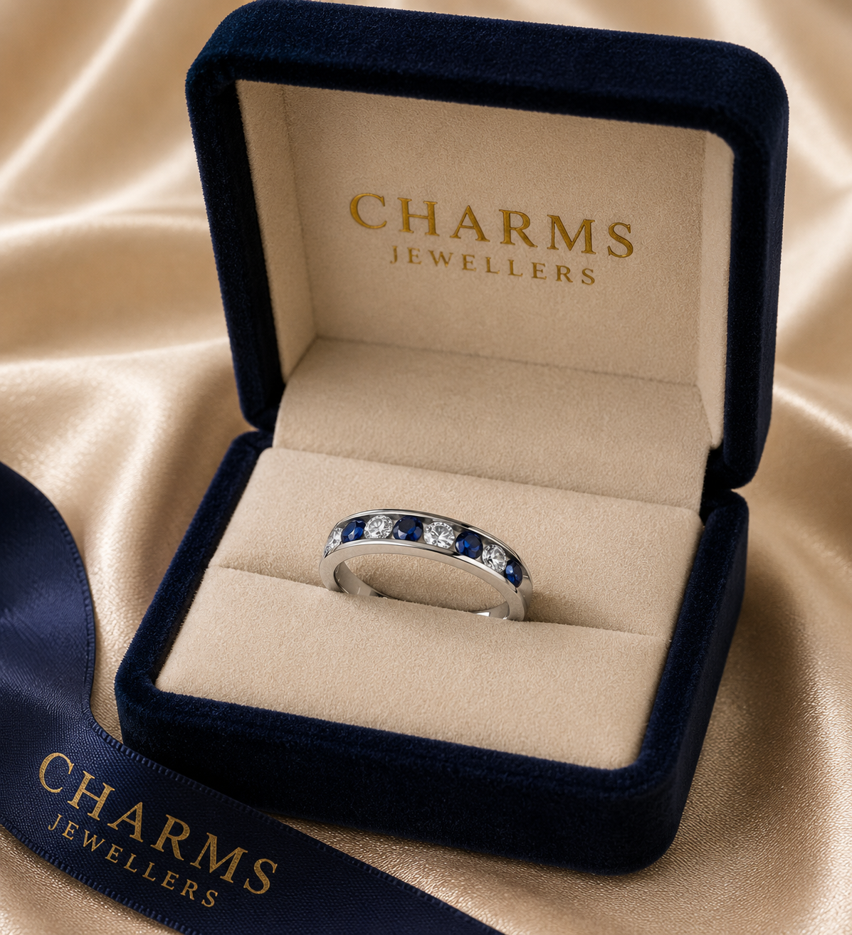 Elegant Silver Half-Eternity Ring with Sapphire Blue and Clear CZ Stones