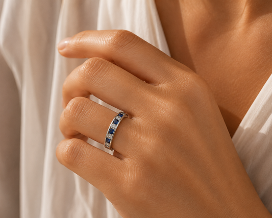 Elegant Silver Half-Eternity Ring with Sapphire Blue and Clear CZ Stones